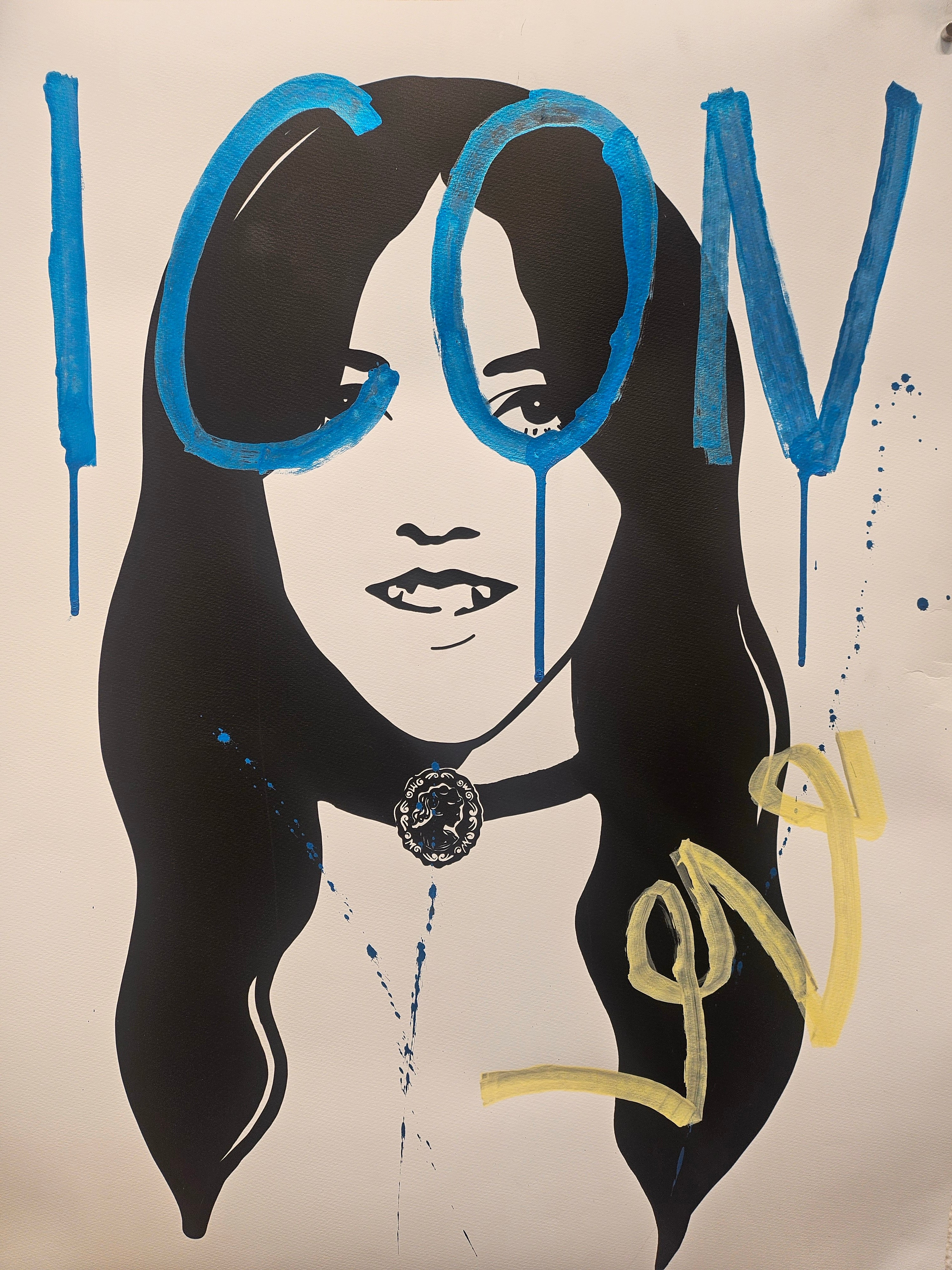 Artistic depiction of a woman with long hair and 'ICON' text on a beige background